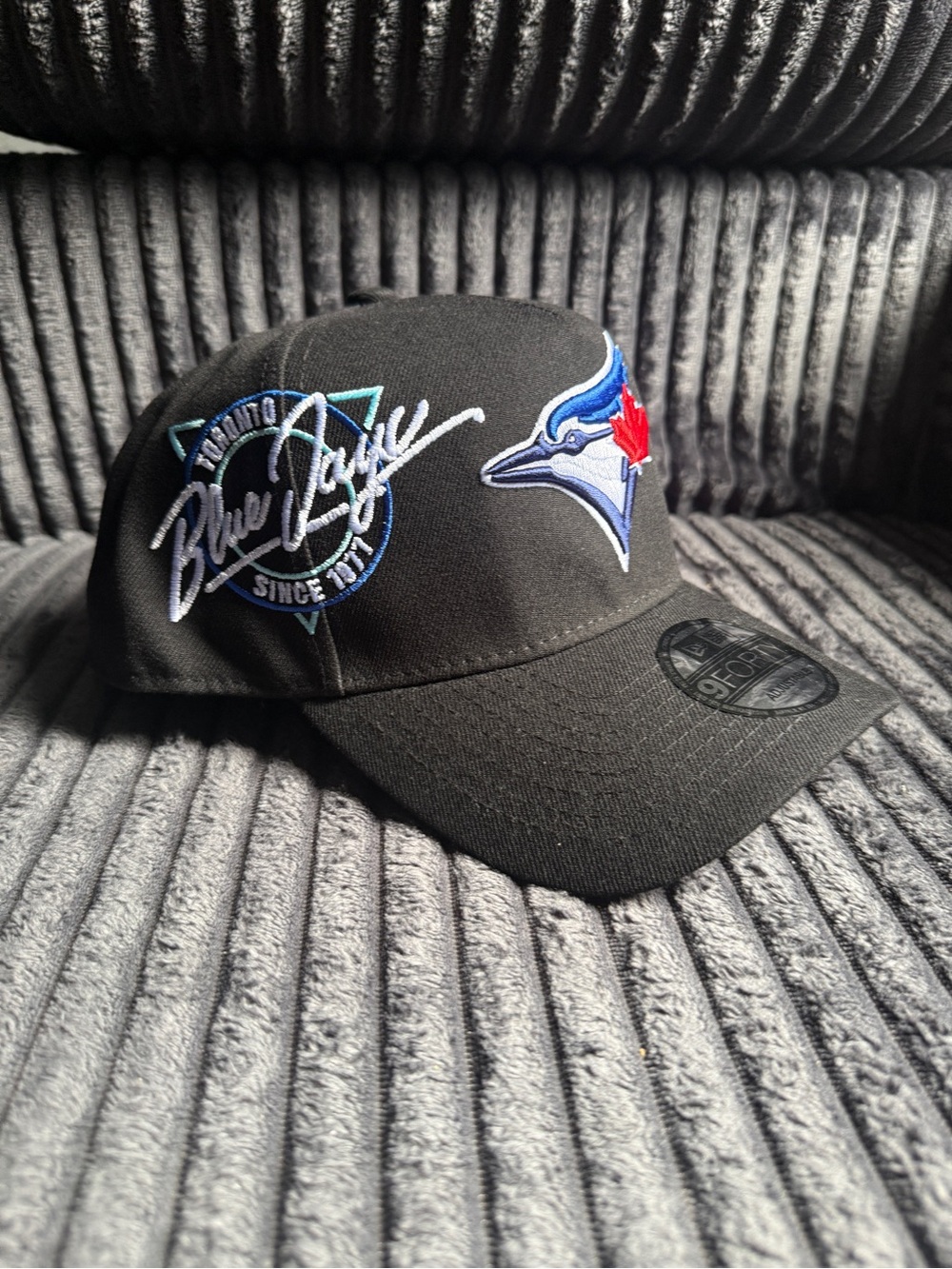 New Era Black Toronto Blue Jays Script Logo Cap with Blue & Red Embroidery